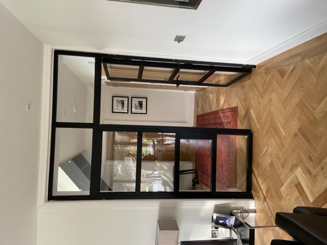 Interior glass partition
